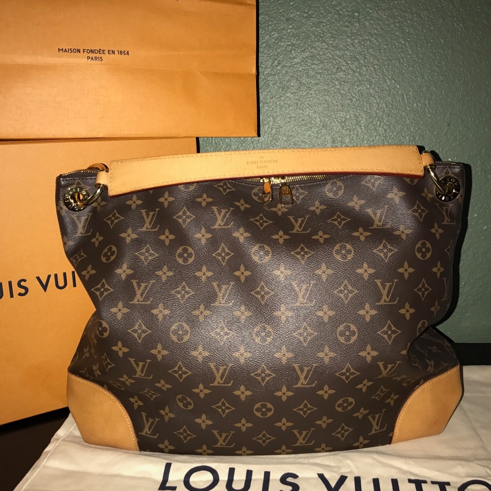 100% authentic Louis Vuitton purse.